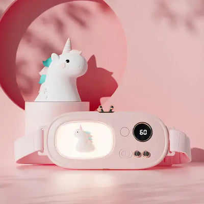 a white camera with a unicorn on top of it