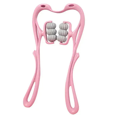 a pink toothbrush holder with two balls in it
