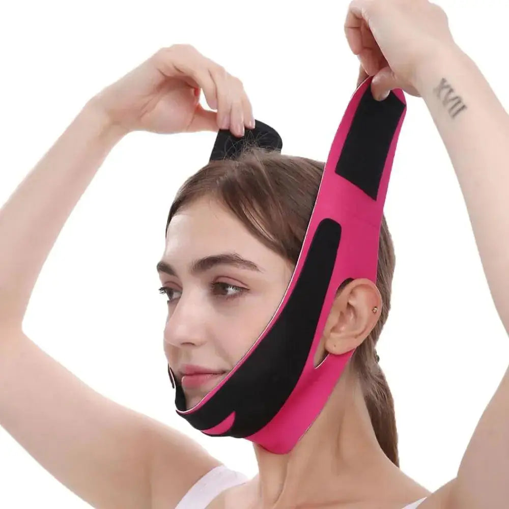 a woman wearing a pink and black head band