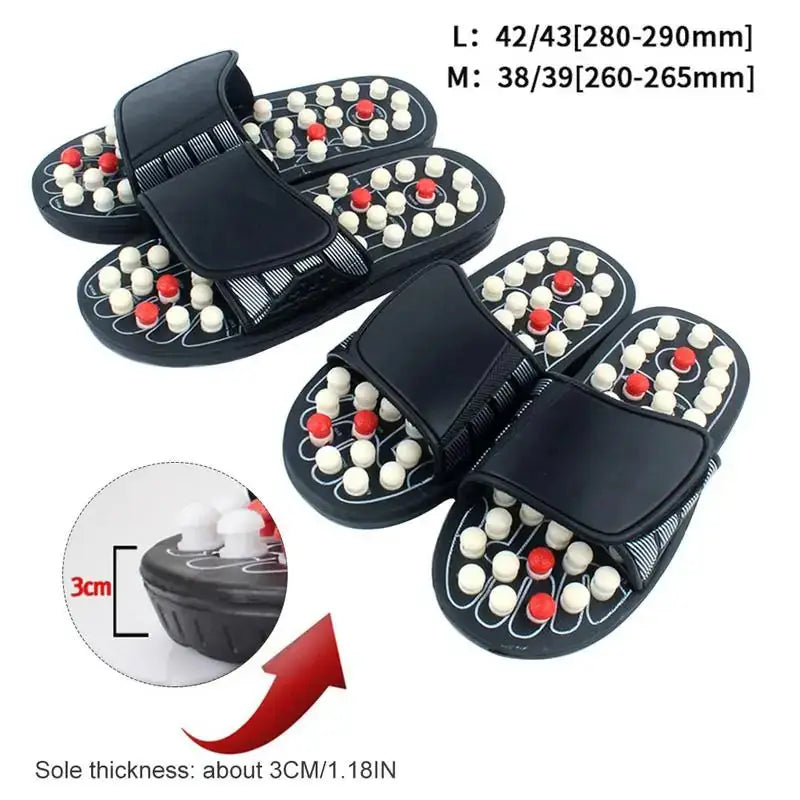 a pair of black and white slippers with red and white beads