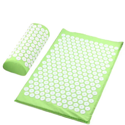 a green mat with white circles on it