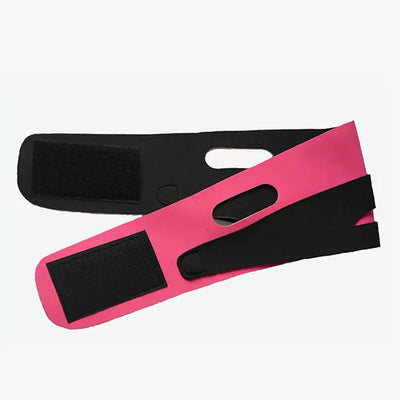 a pair of pink and black wrist wraps